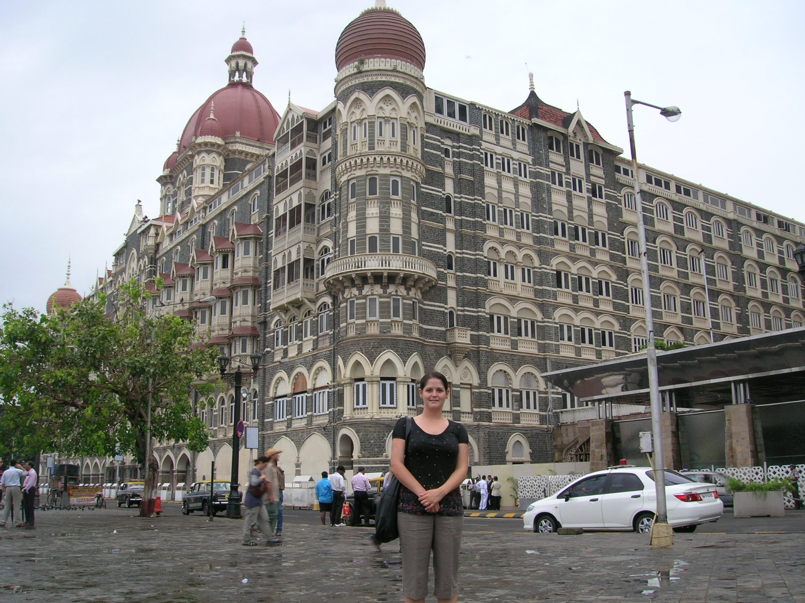 Standing before the Taj Mahal Hotel